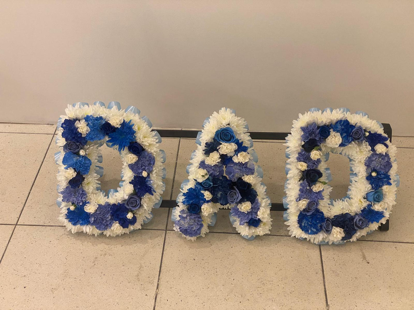 Flower line tribute lettering